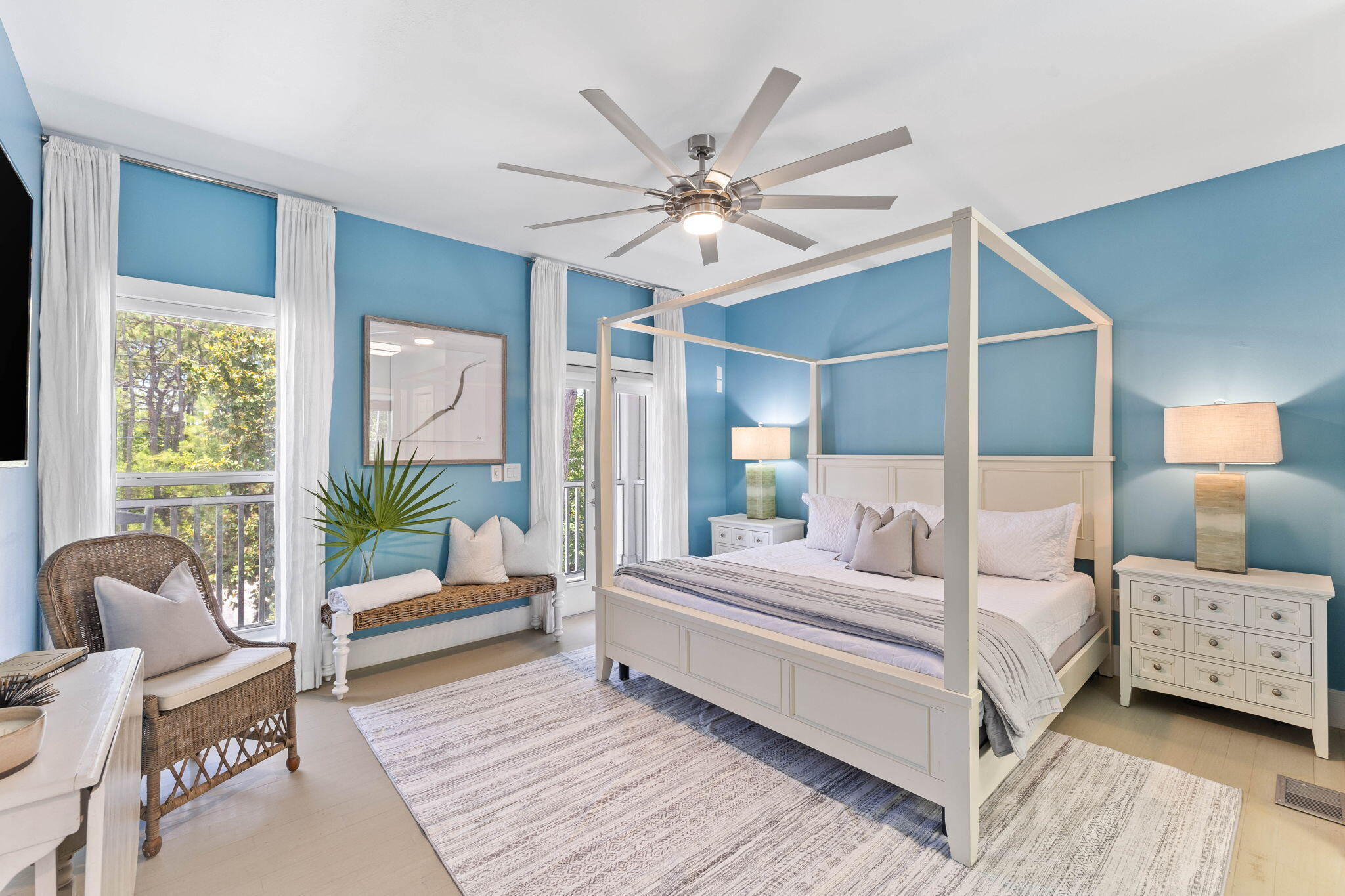 429 Montigo Avenue Santa Rosa Beach, FL 32459 - Photo 28 of 62 a bedroom with a large bed and a chandelier