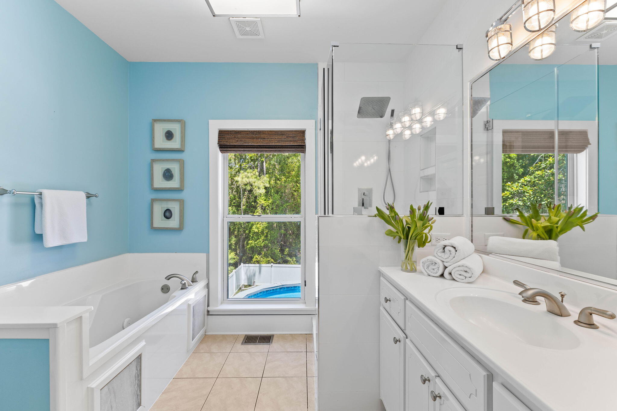 429 Montigo Avenue Santa Rosa Beach, FL 32459 - Photo 33 of 62 a bathroom with a bathtub sink and mirror