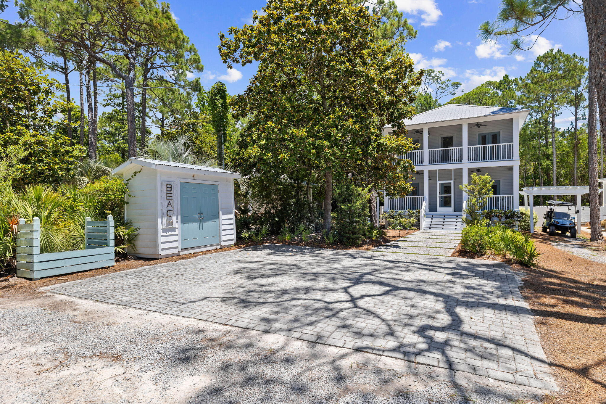 429 Montigo Avenue Santa Rosa Beach, FL 32459 - Photo 6 of 62 a view of a house with backyard and sitting area
