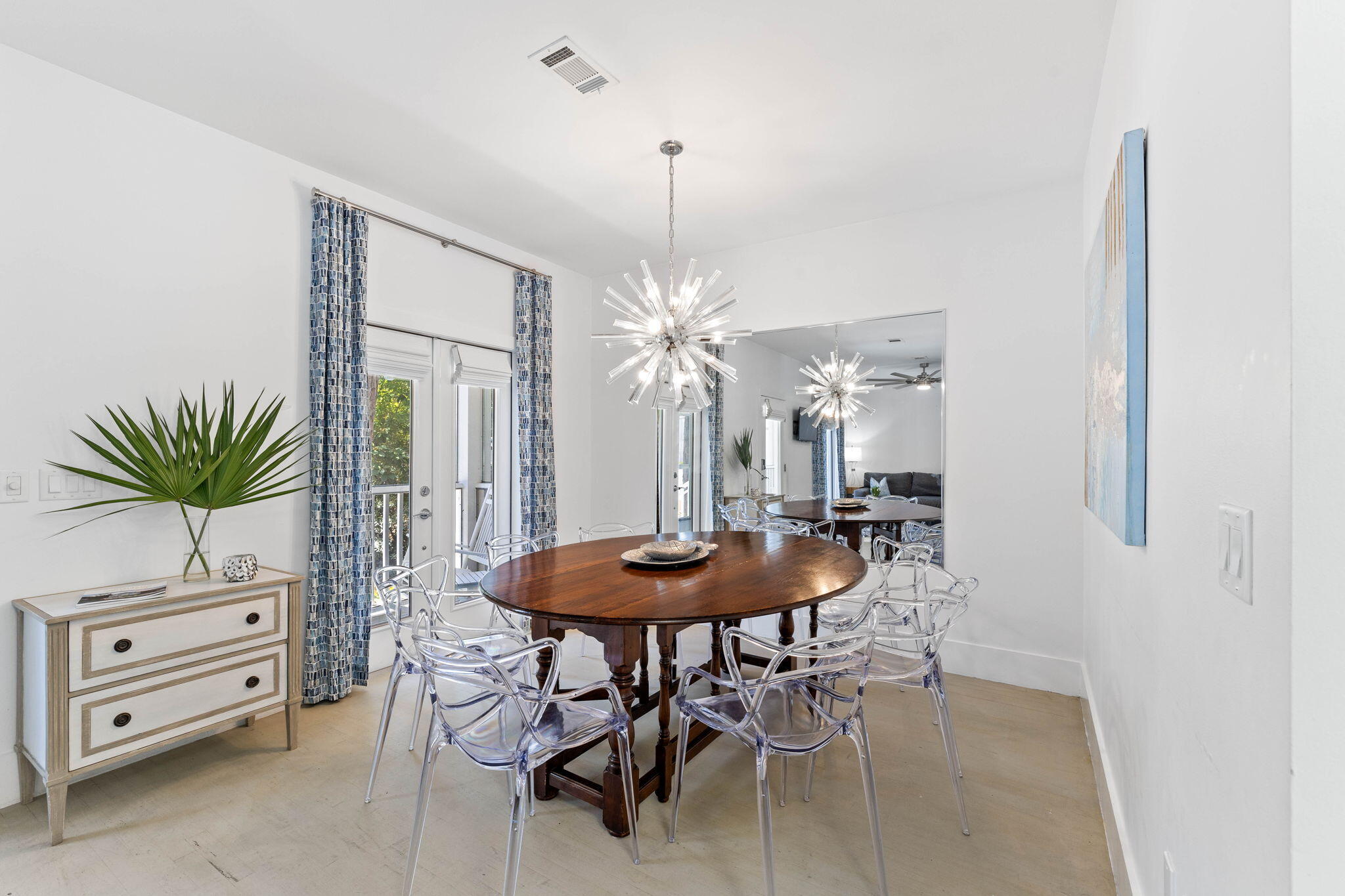 429 Montigo Avenue Santa Rosa Beach, FL 32459 - Photo 10 of 62 a dining room with furniture and a chandelier
