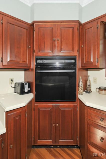 100 Springfield Drive Bangor, PA 18013 - Photo 18 of 39 a kitchen with wooden cabinets and a stove top oven
