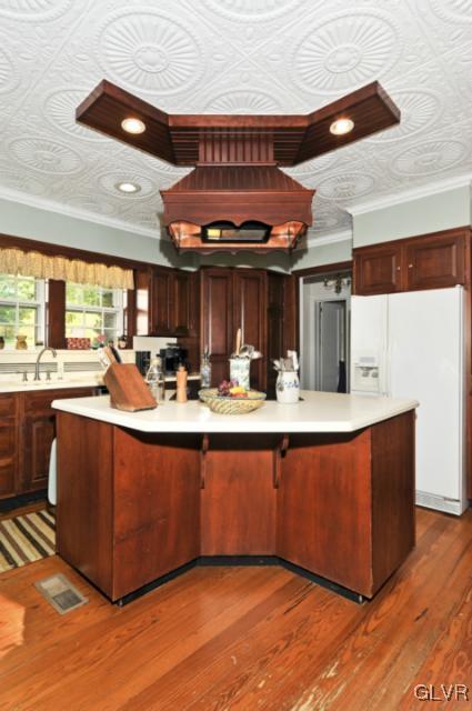 100 Springfield Drive Bangor, PA 18013 - Photo 20 of 39 a large kitchen with stainless steel appliances wooden floors and large window