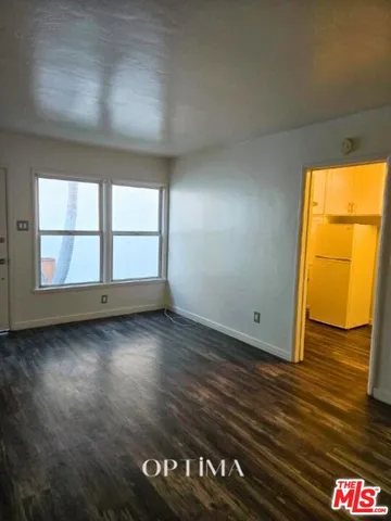 a view of an empty room and window