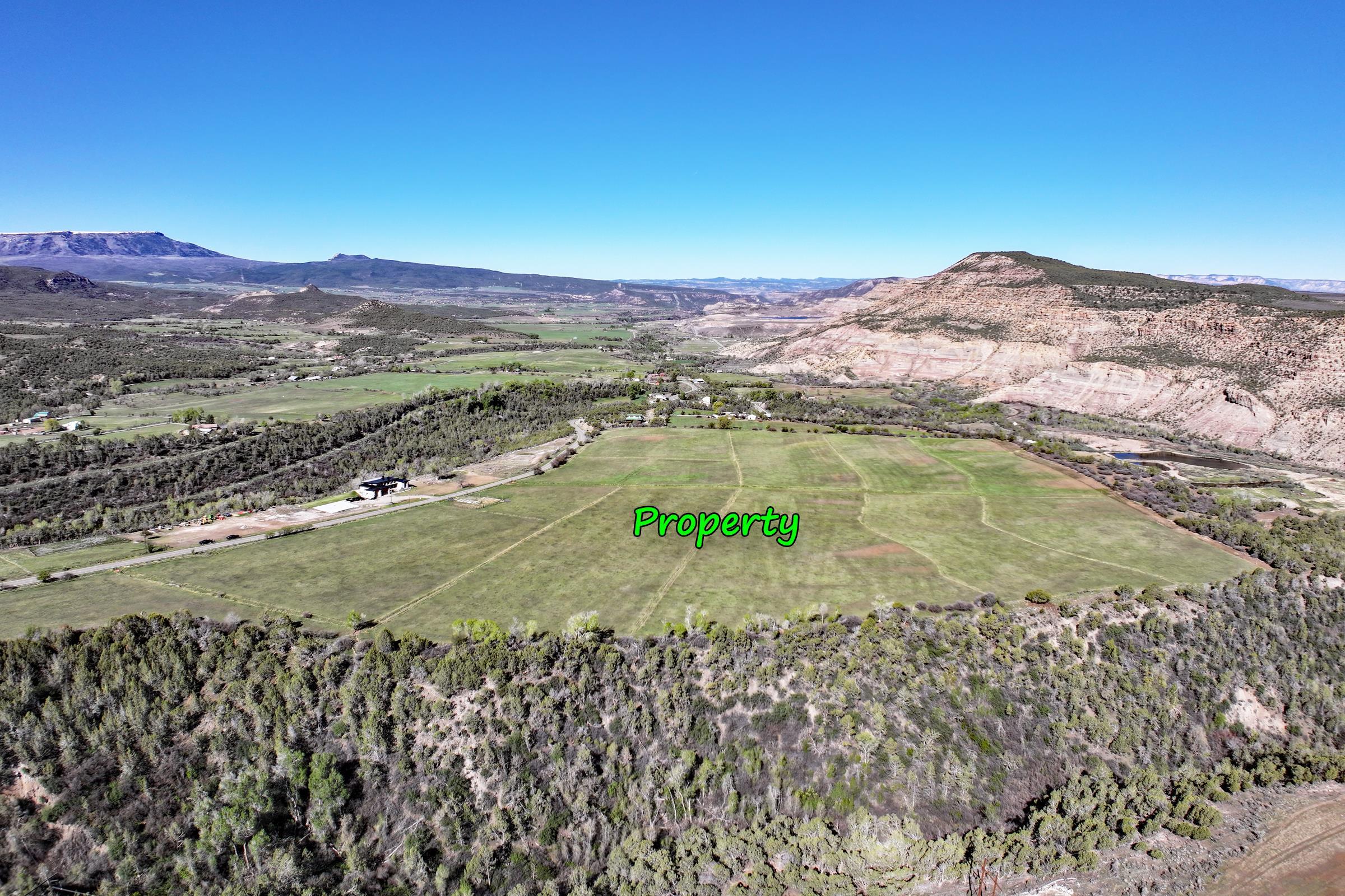 12482 54 54 7/10 Road Molina, CO 81646 - Photo 15 of 23 a view of an aerial view of residential houses with outdoor space and mountain view