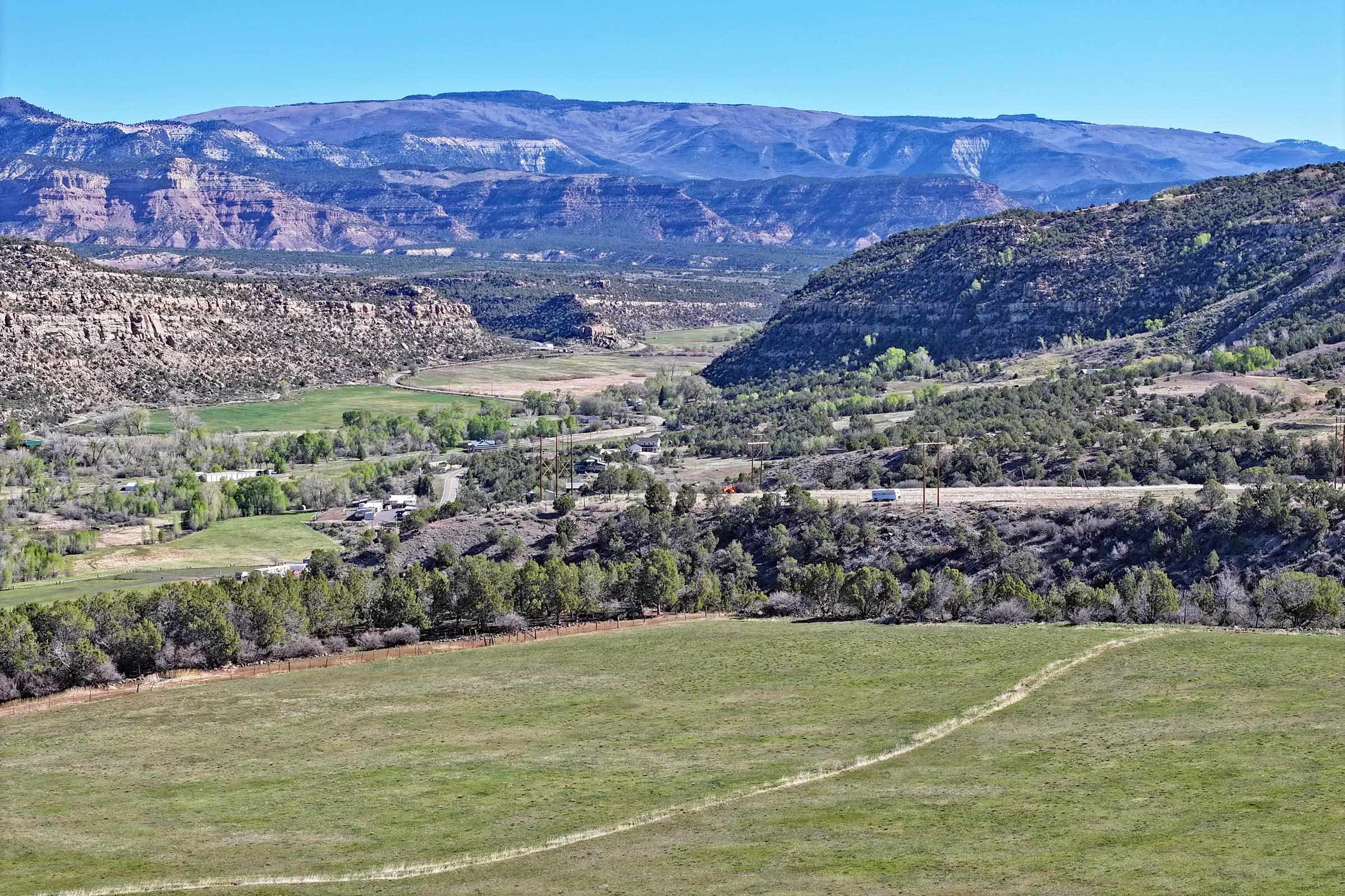 12482 54 54 7/10 Road Molina, CO 81646 - Photo 17 of 23 a view of a field with an ocean