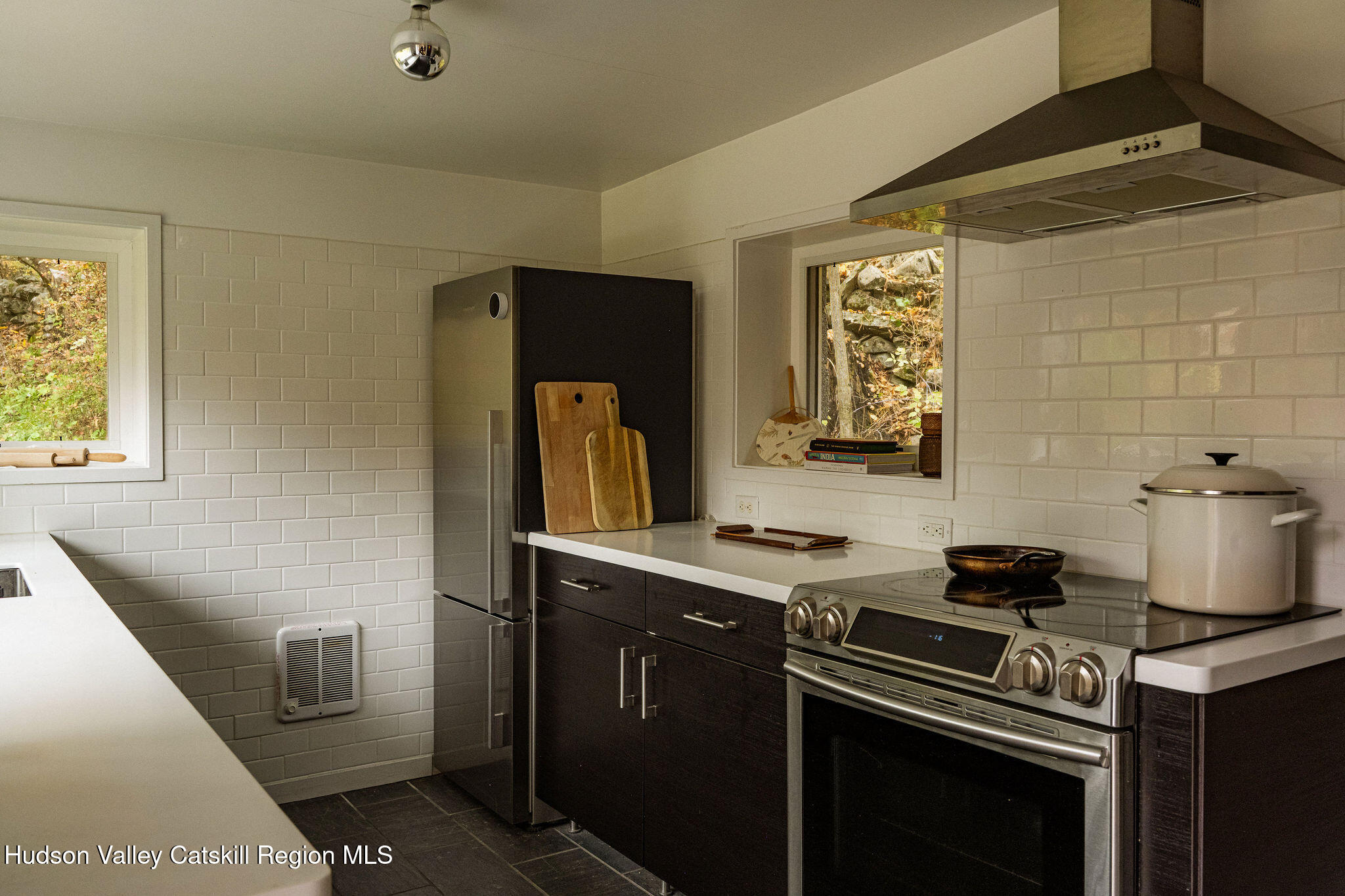 41 Hickory Hill Road Kerhonkson, NY 12446 - Photo 16 of 35 a kitchen with a stove and a refrigerator