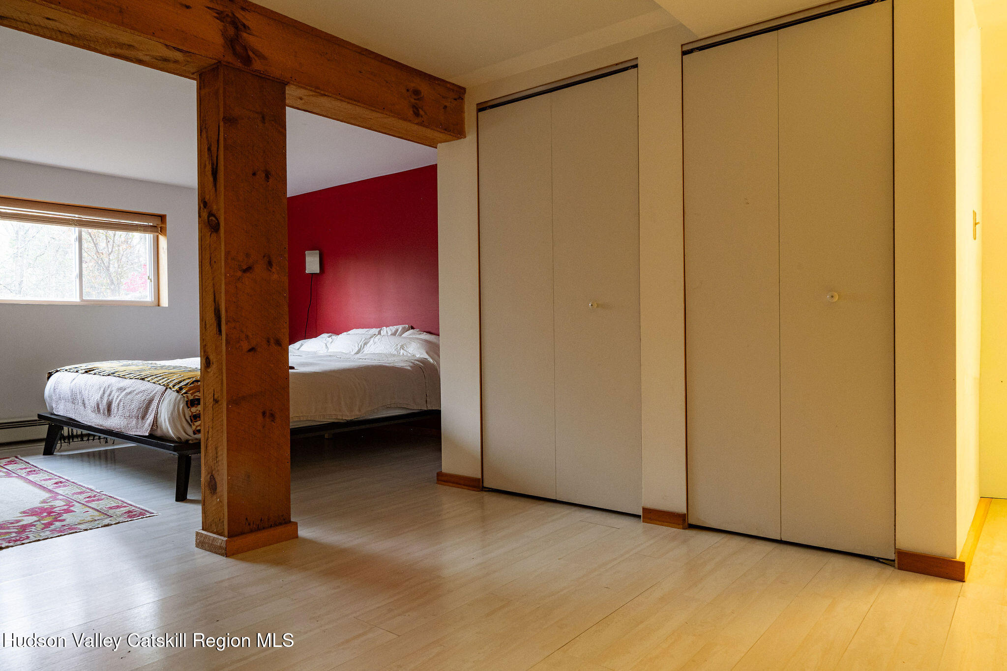 41 Hickory Hill Road Kerhonkson, NY 12446 - Photo 22 of 35 a bedroom with a bed and a lamp