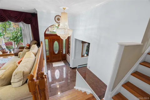 a view of living room with furniture and a window