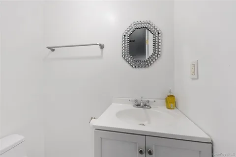 a utility room with cabinets washer and dryer