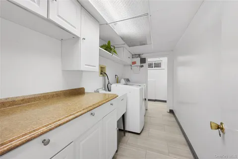 a view of house with a yard front of house