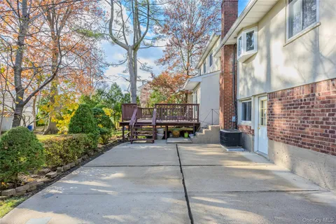 a view of a street with houses on both side