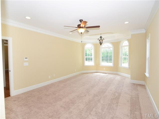 651 Friendship Church Road Middlesex, NC 27557 - Photo 11 of 25 Huge Master Suite w/Sitting Room Double Trey Ceiling with views of the Pond, Patio & Dock, & To Die For Bath! Master Bedroom