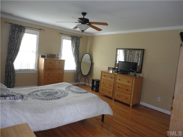 5000 Perception Lane Raleigh, NC 27613 - Photo 12 of 25 Master bedroom has hardwood floors and walk-in-closet