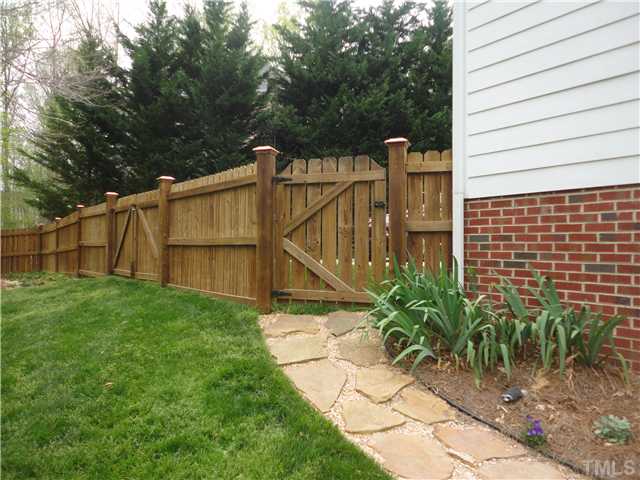5000 Perception Lane Raleigh, NC 27613 - Photo 24 of 25 Stone path from side yard gate to deck