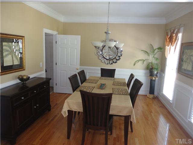 5000 Perception Lane Raleigh, NC 27613 - Photo 3 of 25 Dining room with hardwood floors.