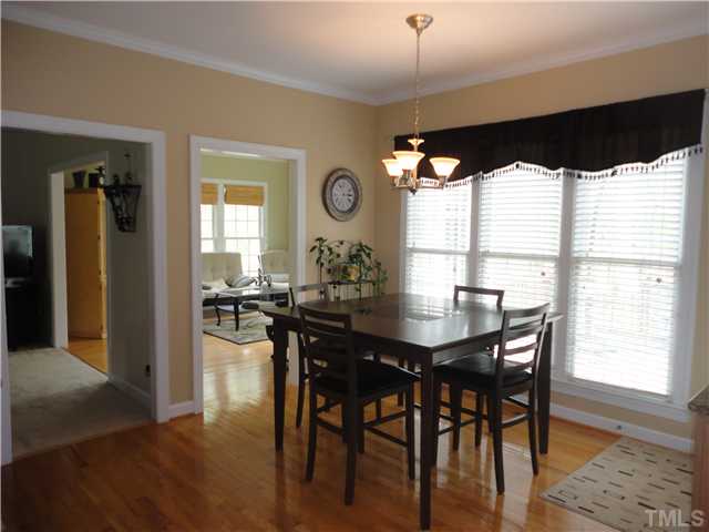 5000 Perception Lane Raleigh, NC 27613 - Photo 6 of 25 large breakfast room with hardwood floors and lots of natural light