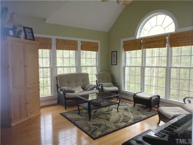 5000 Perception Lane Raleigh, NC 27613 - Photo 7 of 25 Sunroom have fabulous view of large private yard.