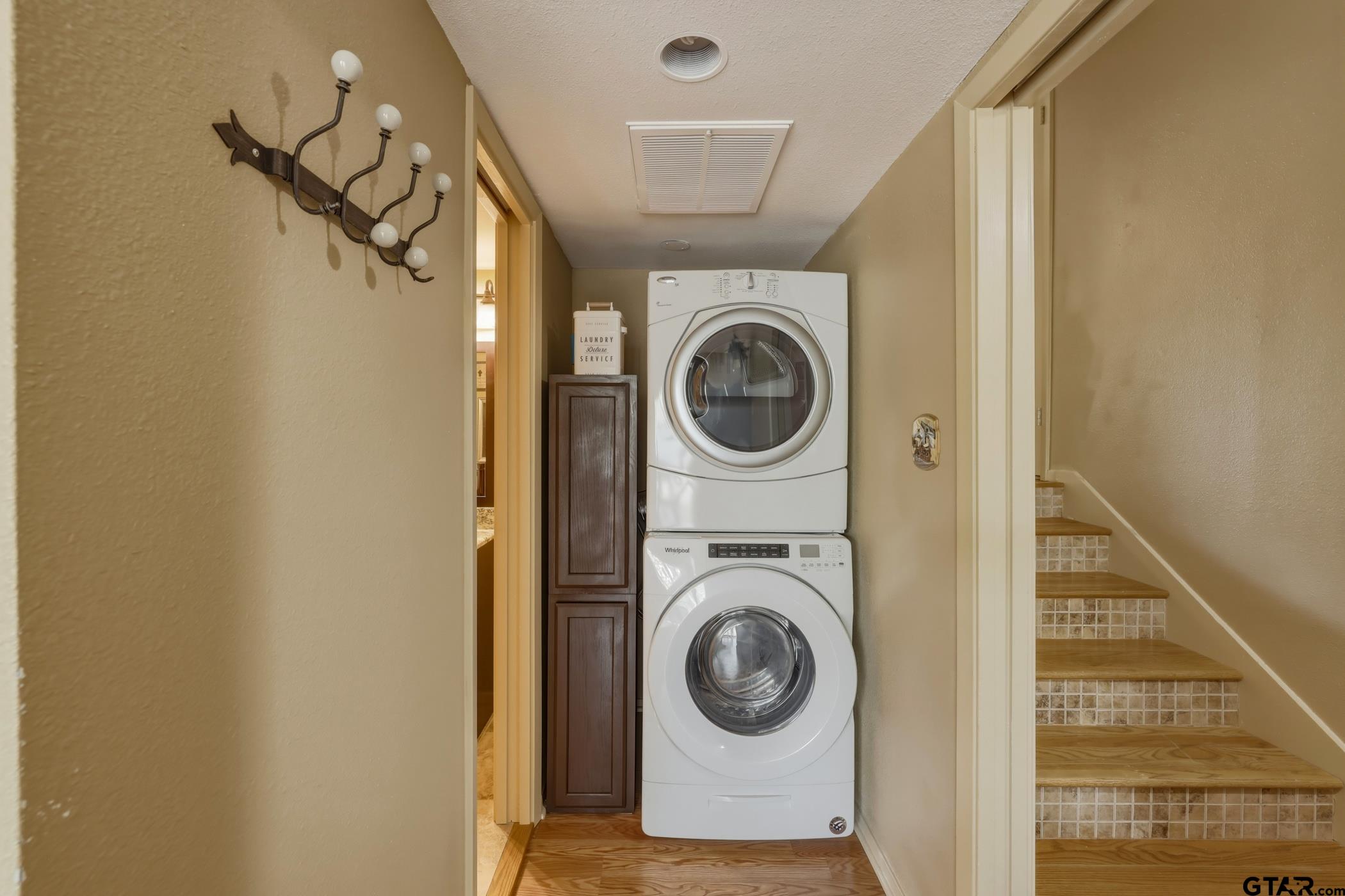 178 Holly Hill Circle Holly Lake Ranch, TX 75765 - Photo 5 of 18 a view of a hallway with washer and dryer