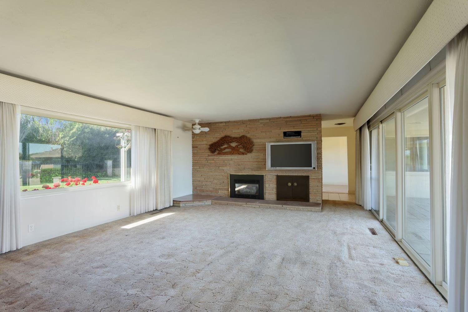 2465 Vernalis Road Tracy, CA 95304 - Photo 13 of 55 an empty room with furniture and window