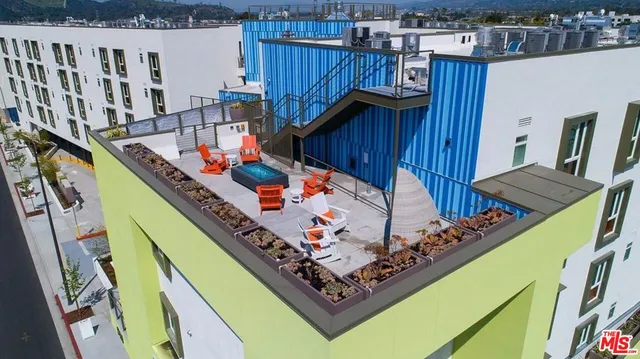 a view of a balcony with chairs