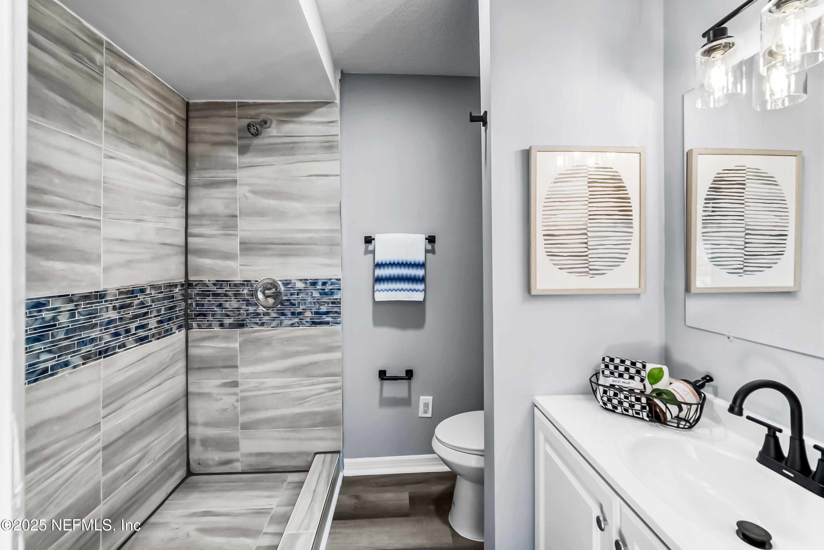 11084 Ker Del Road Jacksonville, FL 32218 - Photo 13 of 26 a bathroom with a sink toilet and shower