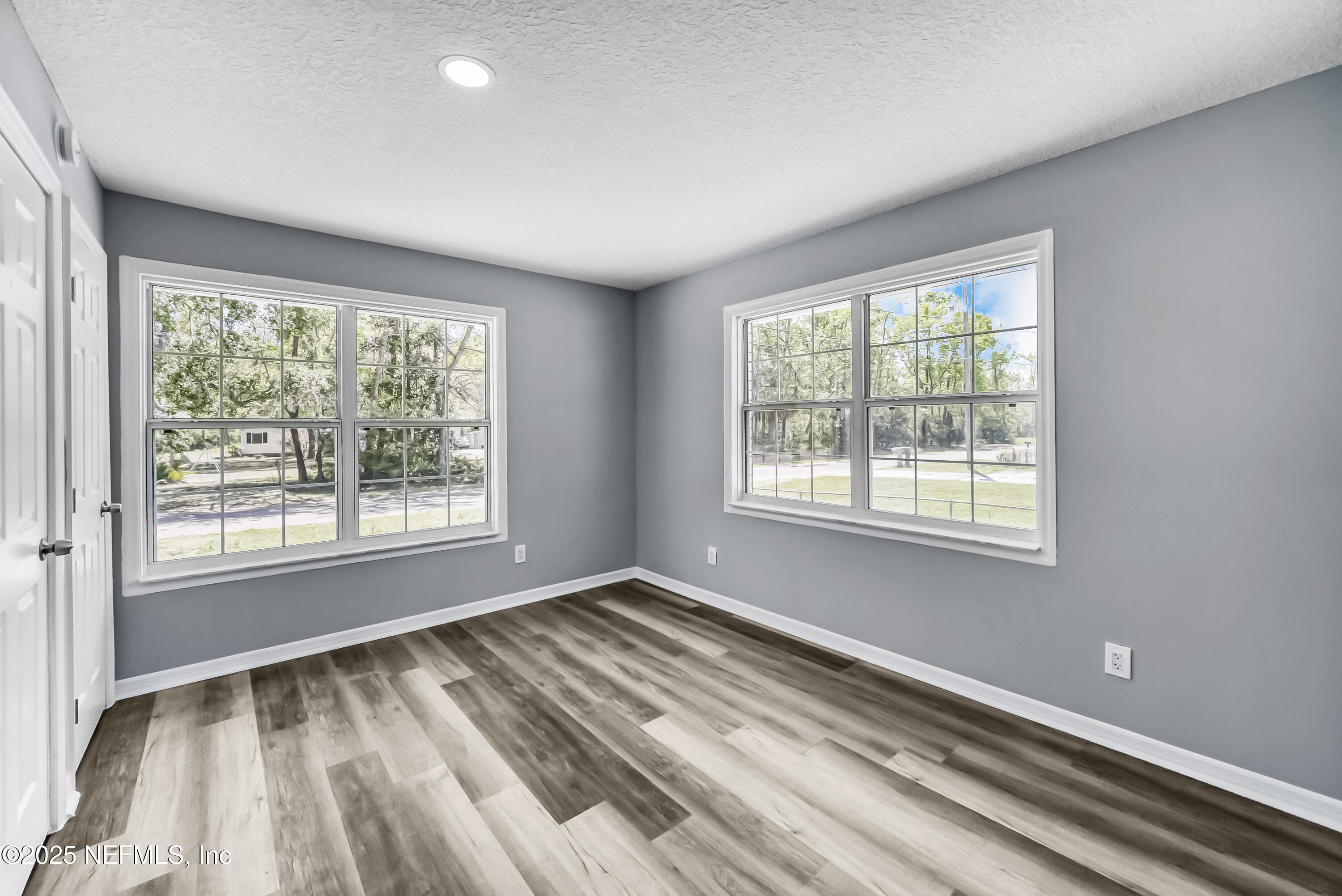 11084 Ker Del Road Jacksonville, FL 32218 - Photo 17 of 26 a view of an empty room with a window