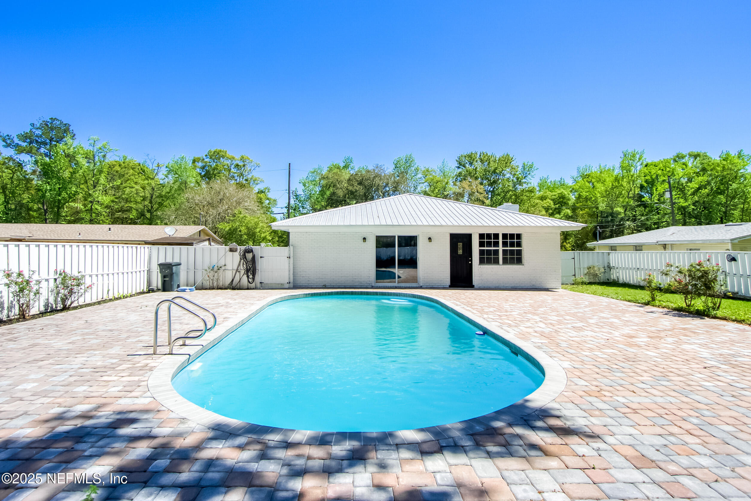 11084 Ker Del Road Jacksonville, FL 32218 - Photo 21 of 26 a view of a house with swimming pool and sitting area