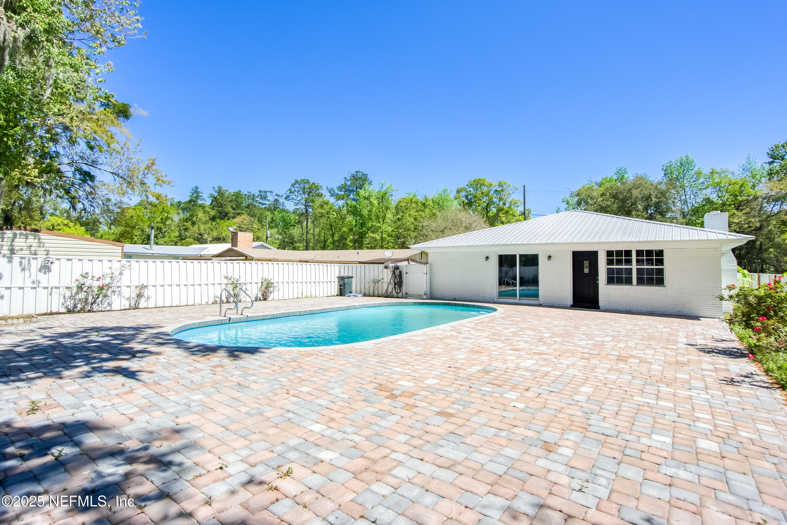 11084 Ker Del Road Jacksonville, FL 32218 - Photo 22 of 26 a front view of a house with a yard