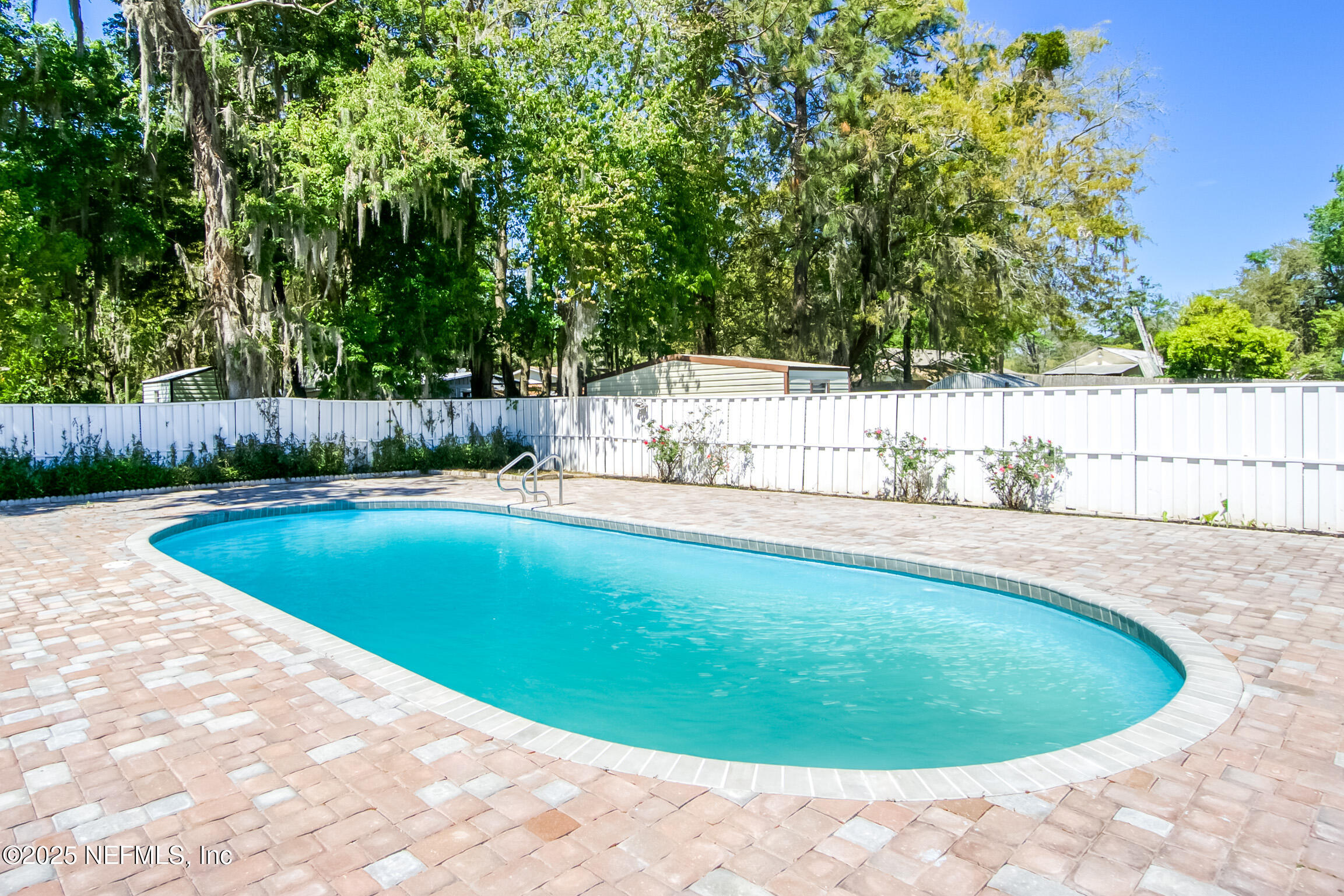 11084 Ker Del Road Jacksonville, FL 32218 - Photo 23 of 26 a view of a swimming pool and a yard