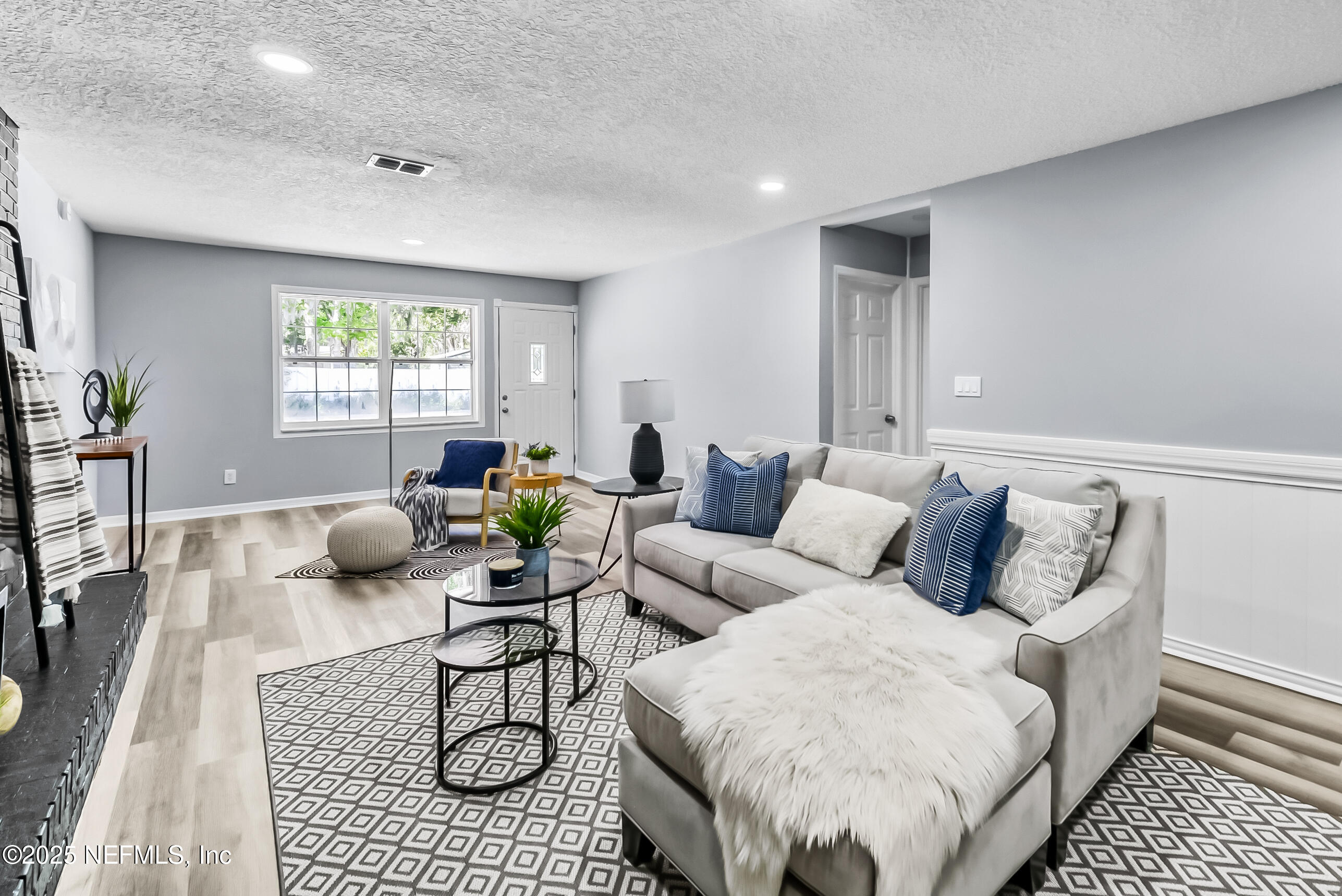 11084 Ker Del Road Jacksonville, FL 32218 - Photo 7 of 26 a living room with furniture rug and window