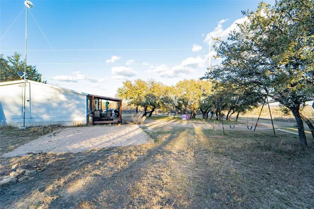 a view of road and trees