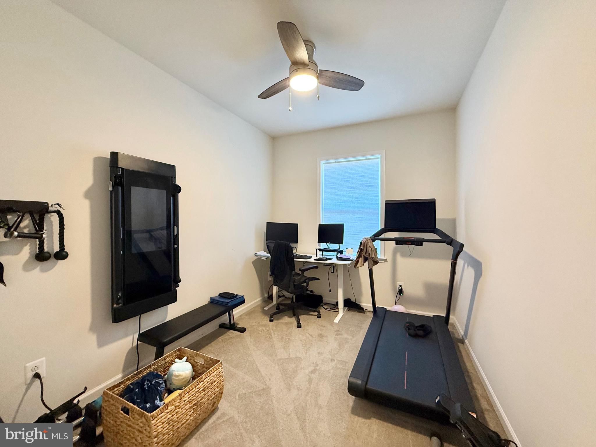 14327 Summit View Lane Rockville, MD 20850 - Photo 12 of 21 a living room with furniture and a flat screen tv