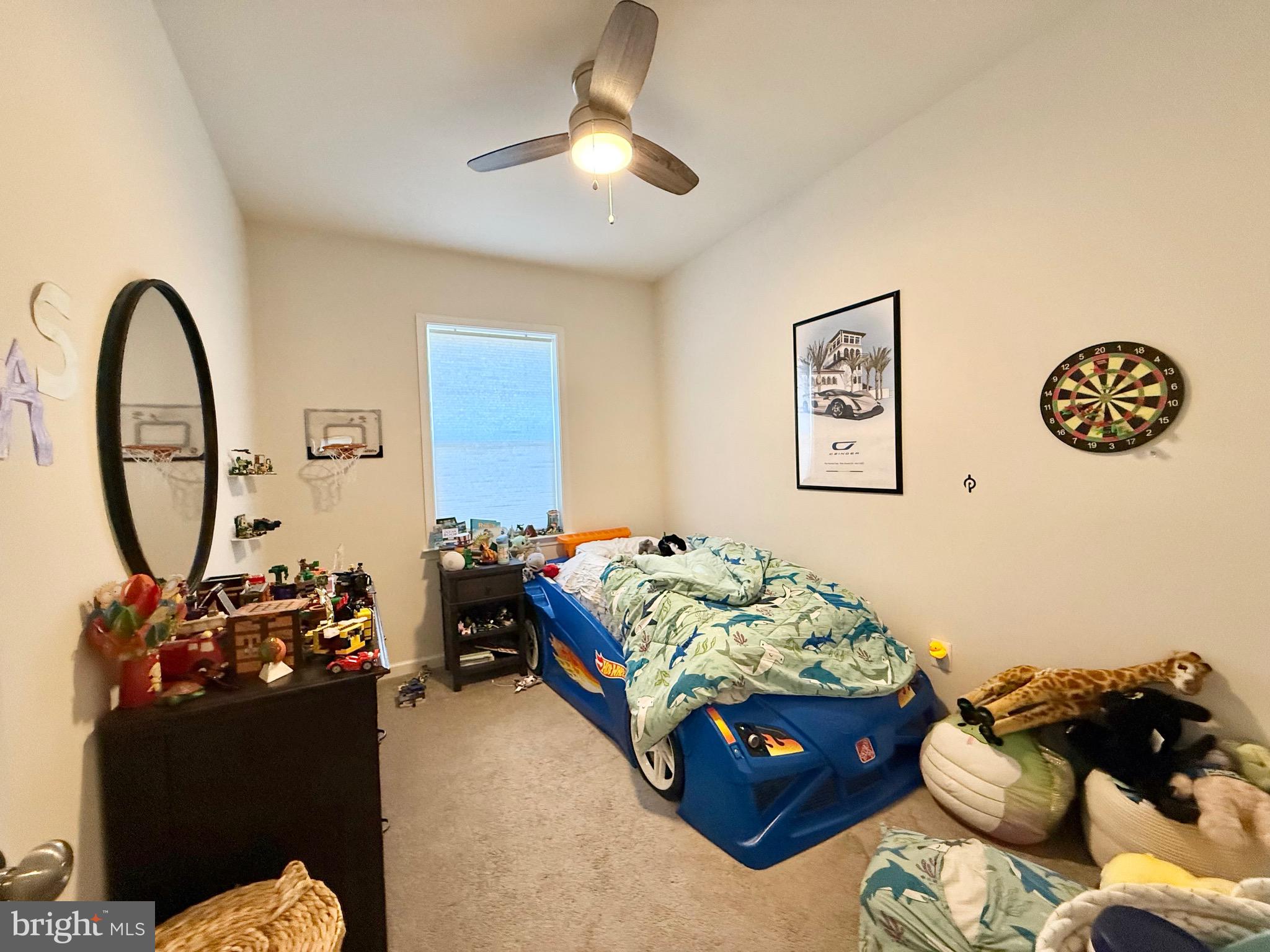 14327 Summit View Lane Rockville, MD 20850 - Photo 13 of 21 a bedroom with bed and a chandelier