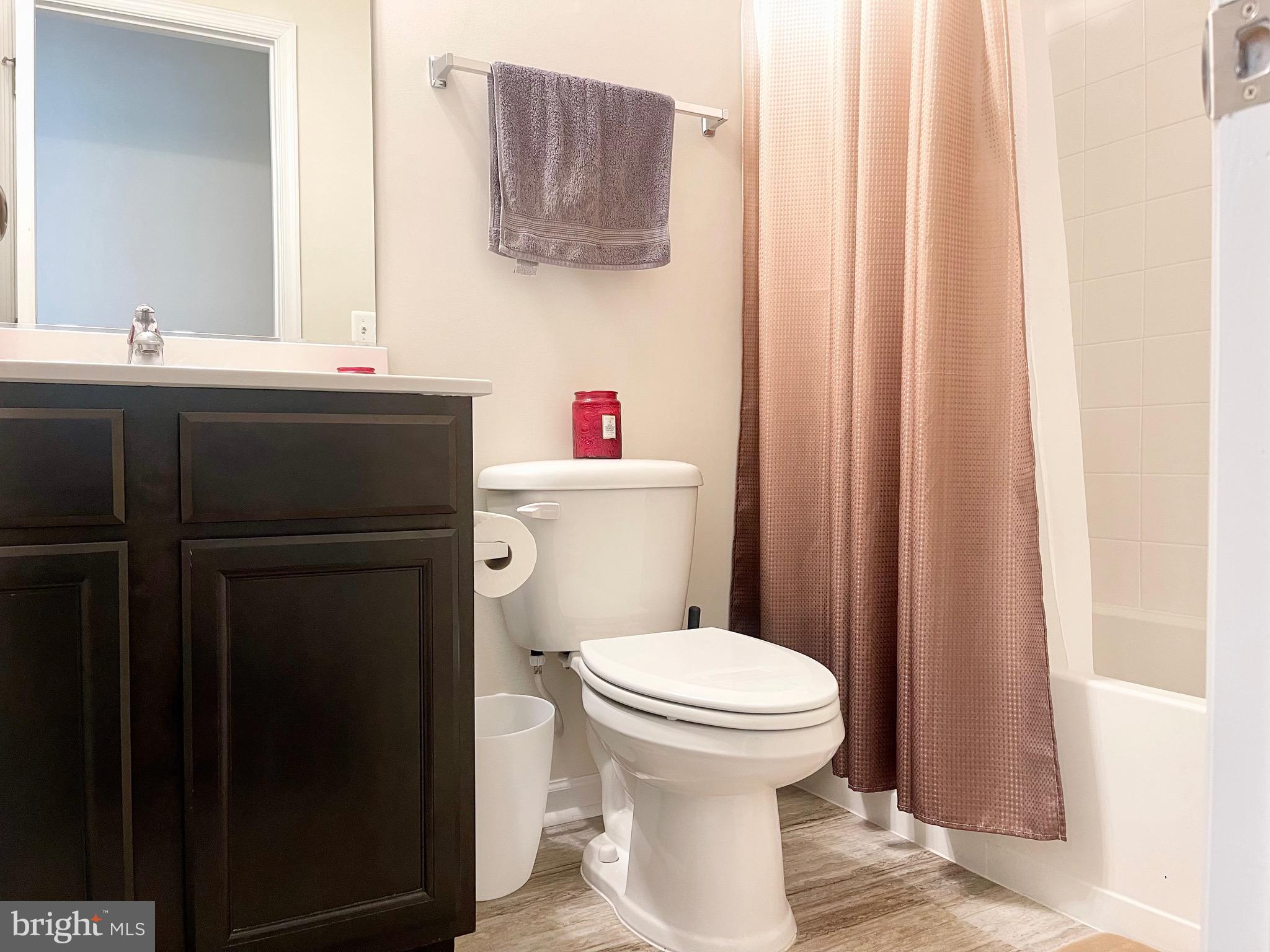 14327 Summit View Lane Rockville, MD 20850 - Photo 19 of 21 a bathroom with a sink and a toilet