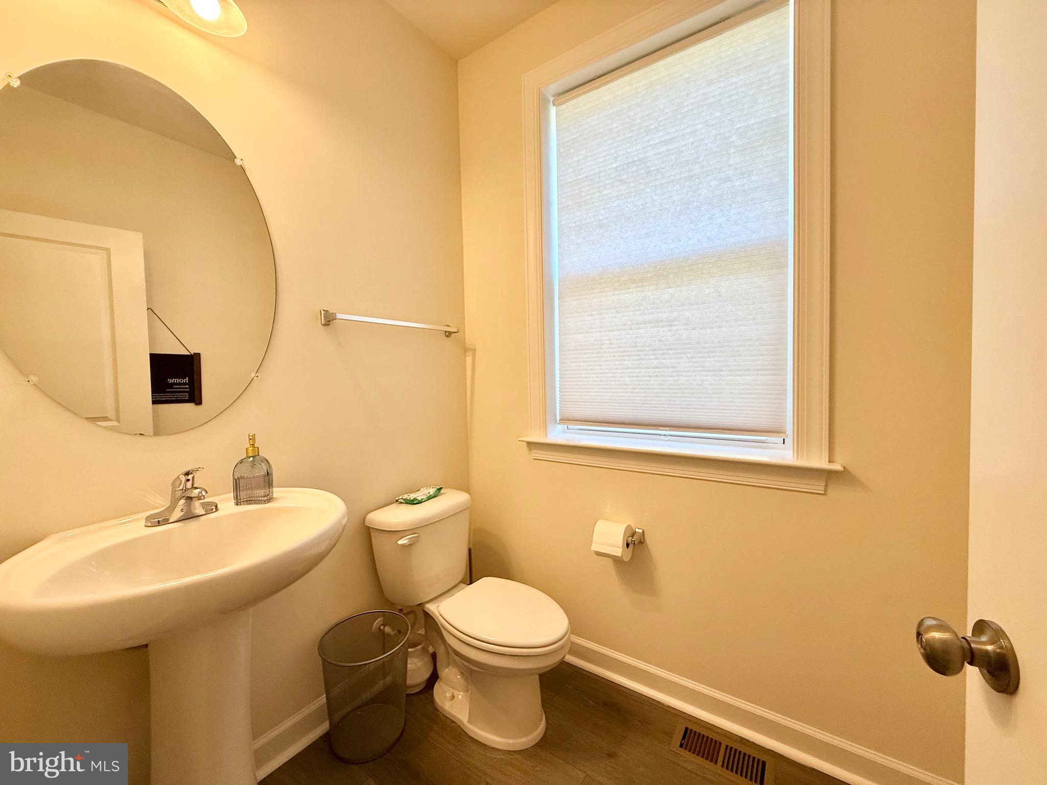 14327 Summit View Lane Rockville, MD 20850 - Photo 20 of 21 a bathroom with a sink and a mirror