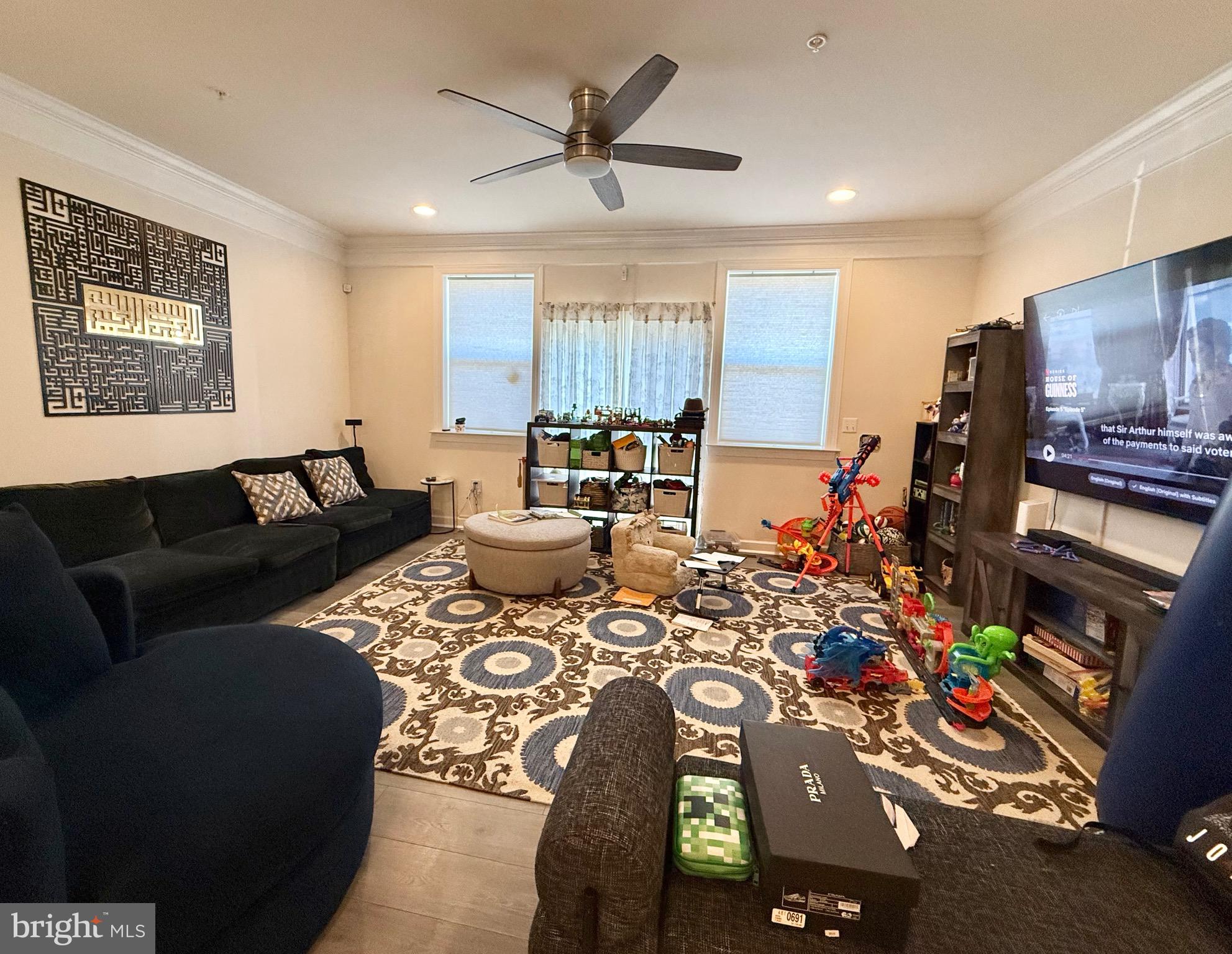 14327 Summit View Lane Rockville, MD 20850 - Photo 6 of 21 a living room with furniture and a flat screen tv