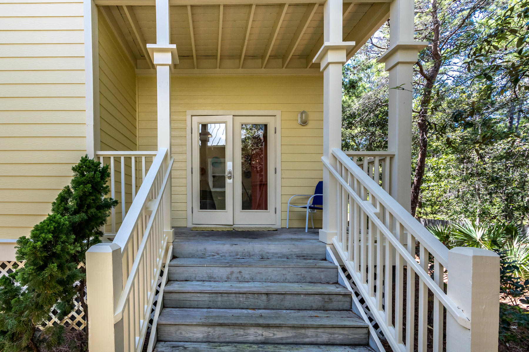460 Hidden Lake Way Santa Rosa Beach, FL 32459 - Photo 2 of 40 a view of a house with wooden stairs
