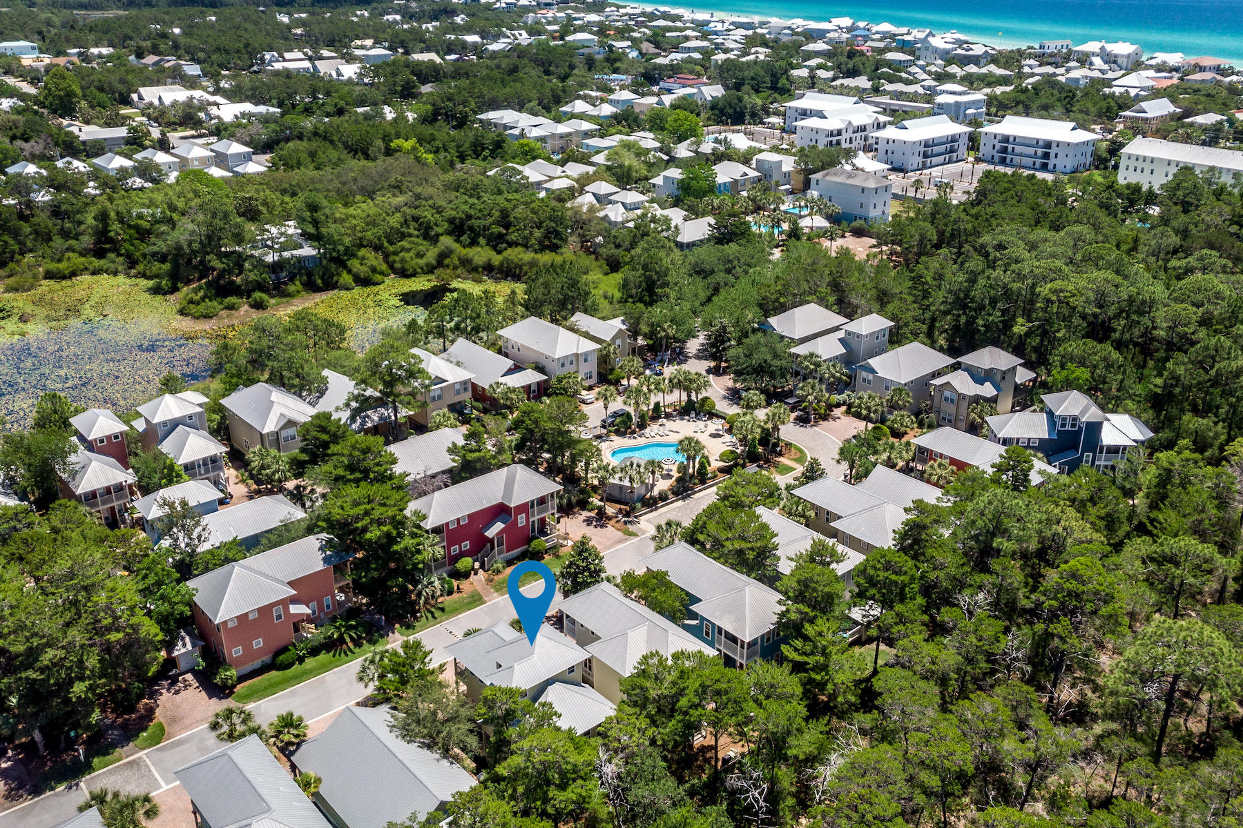 460 Hidden Lake Way Santa Rosa Beach, FL 32459 - Photo 16 of 40 an aerial view of residential houses with outdoor space and trees