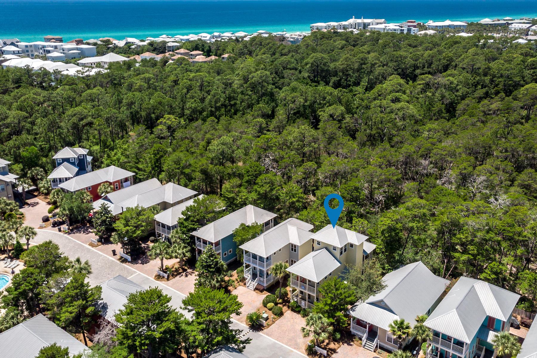 460 Hidden Lake Way Santa Rosa Beach, FL 32459 - Photo 3 of 40 an aerial view of a house with a yard