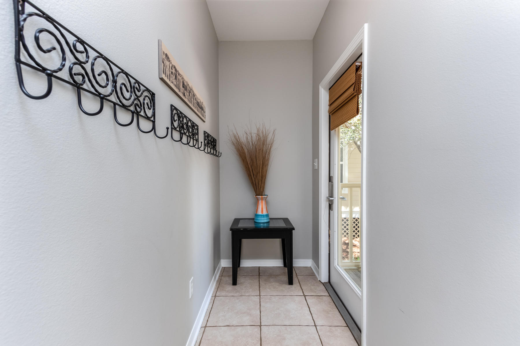 460 Hidden Lake Way Santa Rosa Beach, FL 32459 - Photo 22 of 40 a view of a hallway with seating area