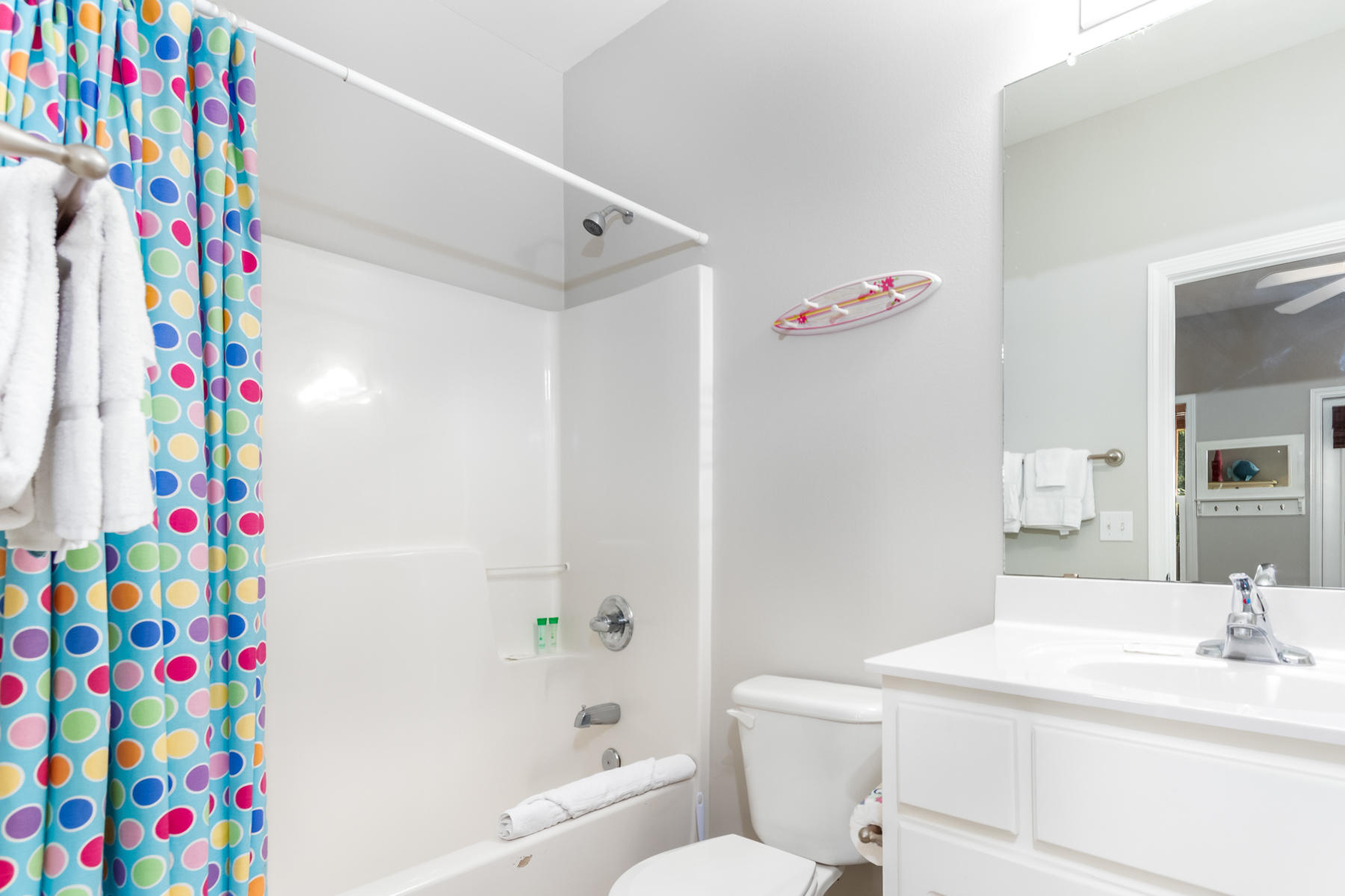 460 Hidden Lake Way Santa Rosa Beach, FL 32459 - Photo 29 of 40 a bathroom with a sink a bath tub and a curtain