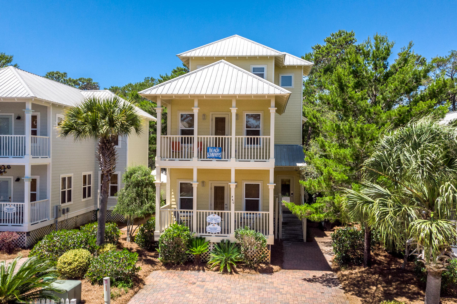 460 Hidden Lake Way Santa Rosa Beach, FL 32459 - Photo 4 of 40 a front view of a multi story residential apartment building