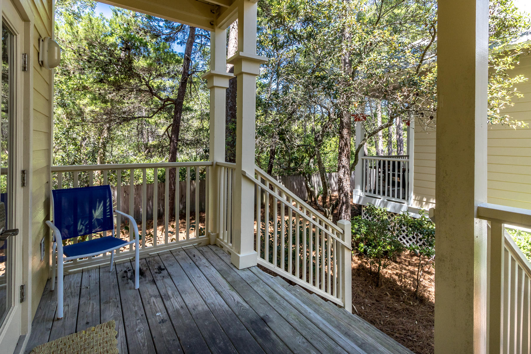 460 Hidden Lake Way Santa Rosa Beach, FL 32459 - Photo 8 of 40 a view of balcony with wooden floor and outdoor seating
