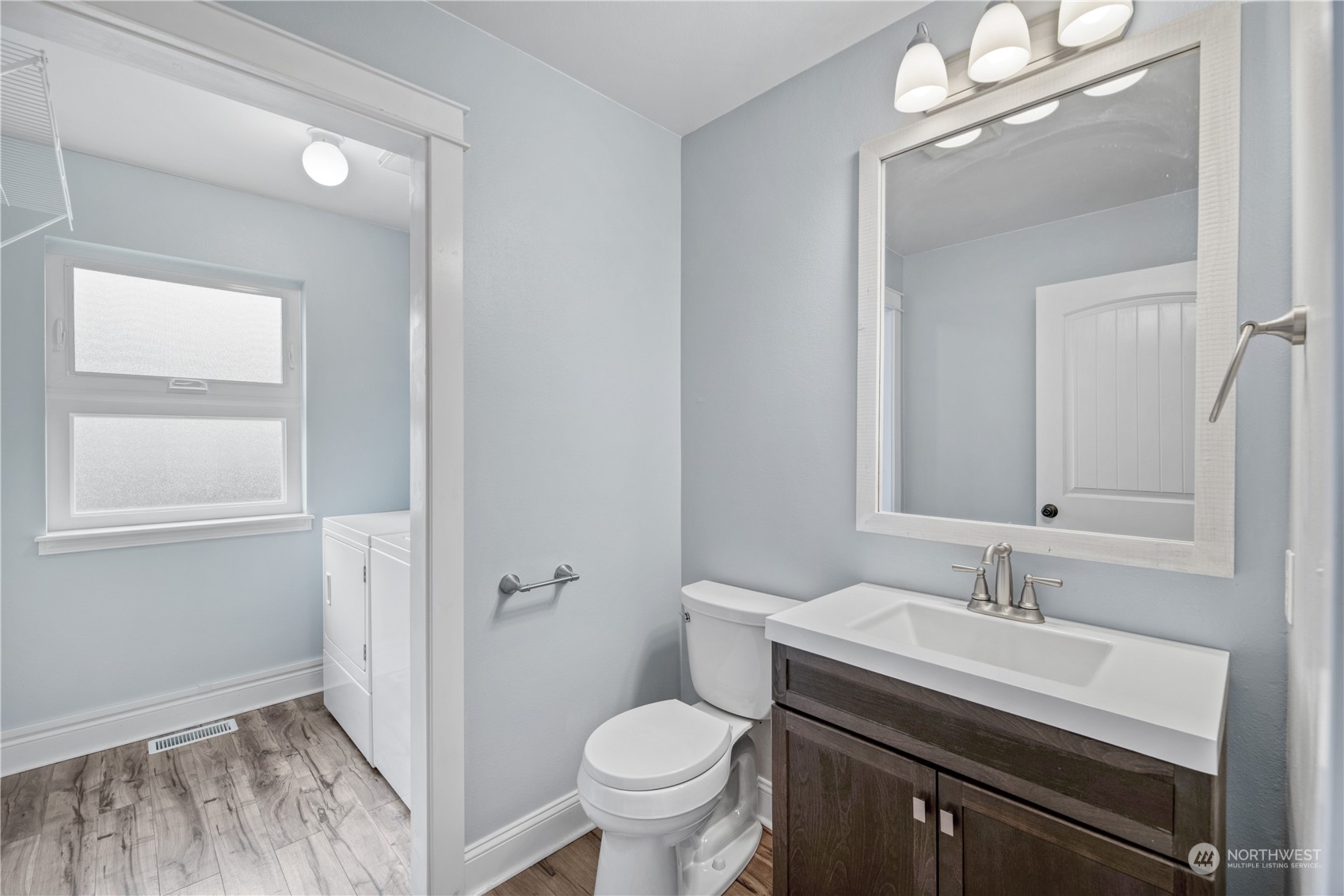 15014 Silver Firs Drive Everett, WA 98208 - Photo 12 of 30 a bathroom with a sink a toilet and a mirror