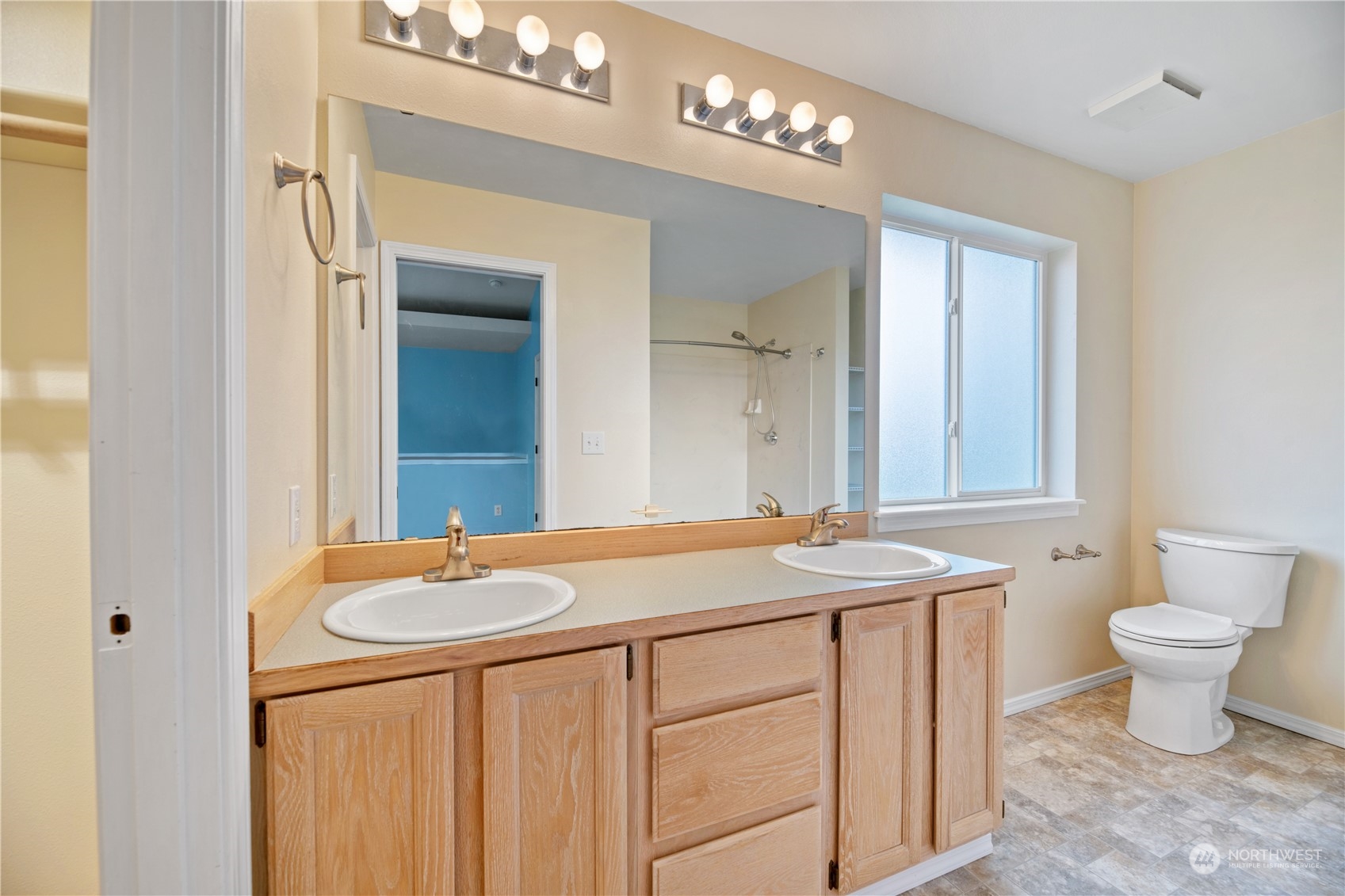 15014 Silver Firs Drive Everett, WA 98208 - Photo 16 of 30 a bathroom with a sink and a mirror