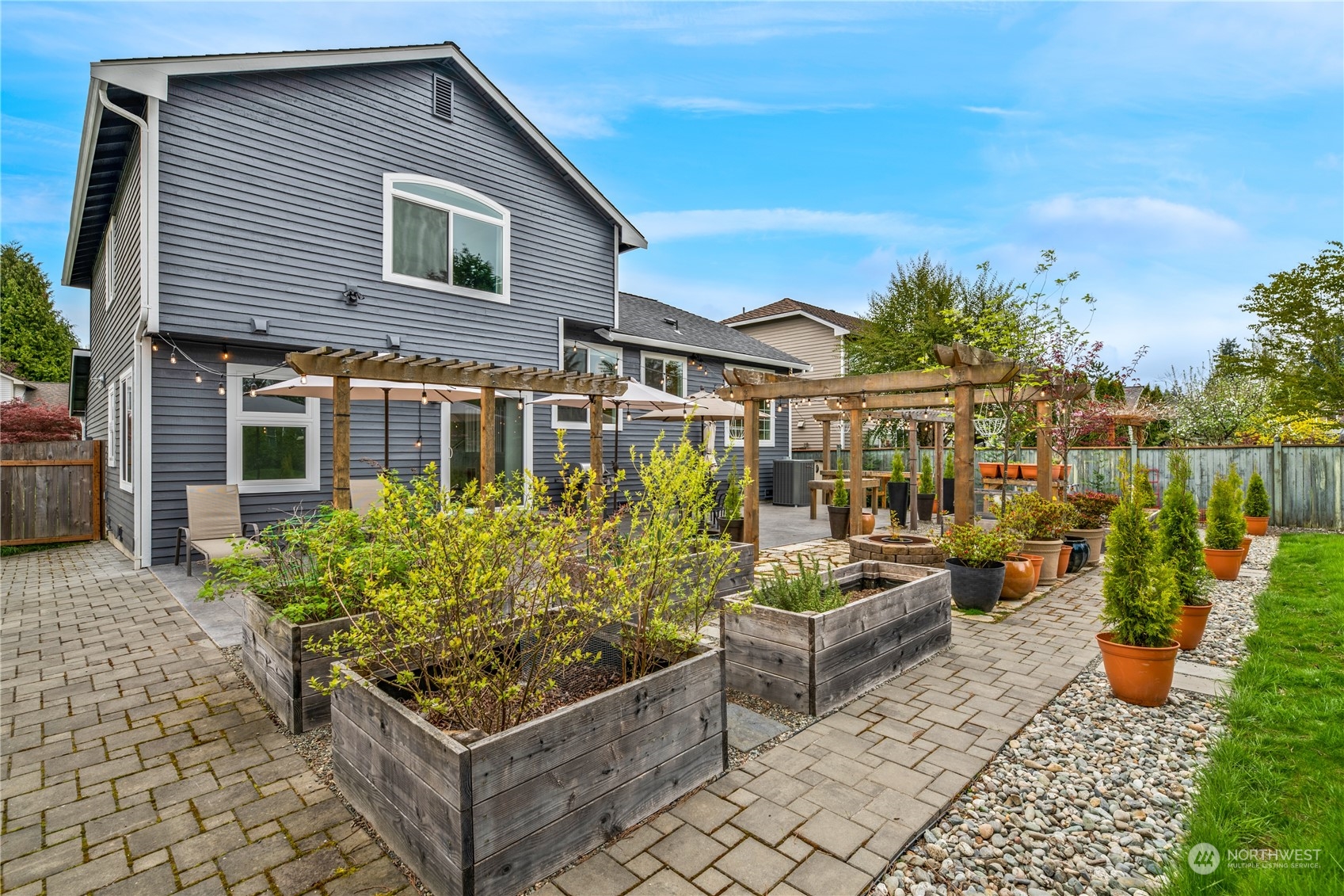 15014 Silver Firs Drive Everett, WA 98208 - Photo 24 of 30 a front view of a house with garden