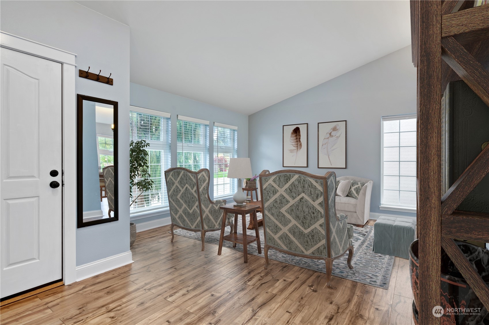 15014 Silver Firs Drive Everett, WA 98208 - Photo 4 of 30 a living room with furniture a flat screen tv and a floor to ceiling window