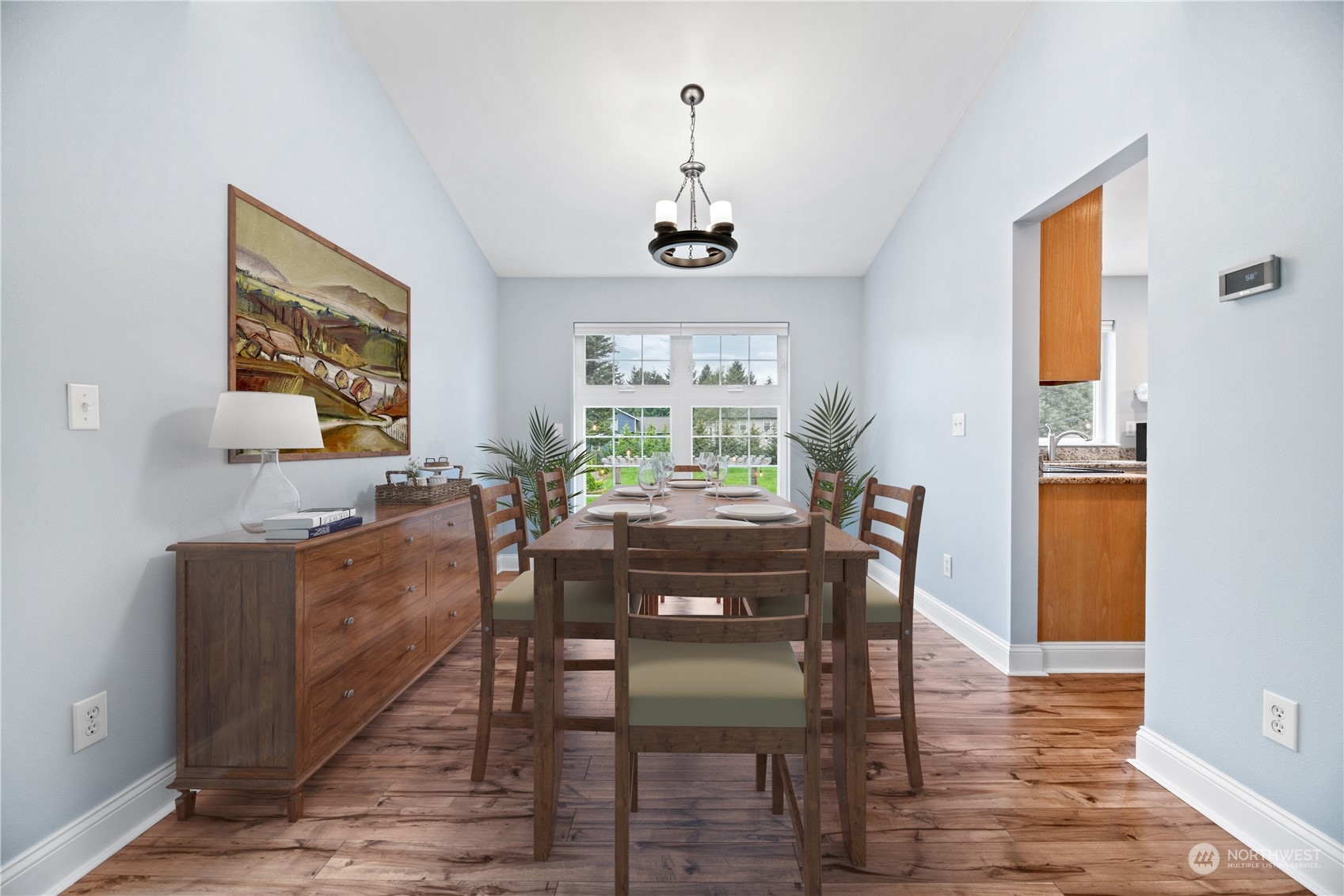 15014 Silver Firs Drive Everett, WA 98208 - Photo 6 of 30 a view of a dining room with furniture window and wooden floor
