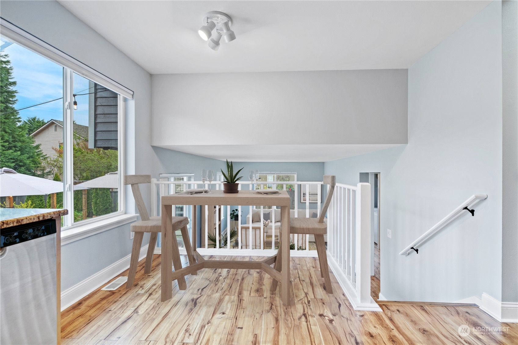 15014 Silver Firs Drive Everett, WA 98208 - Photo 9 of 30 a view of a house with wooden floor