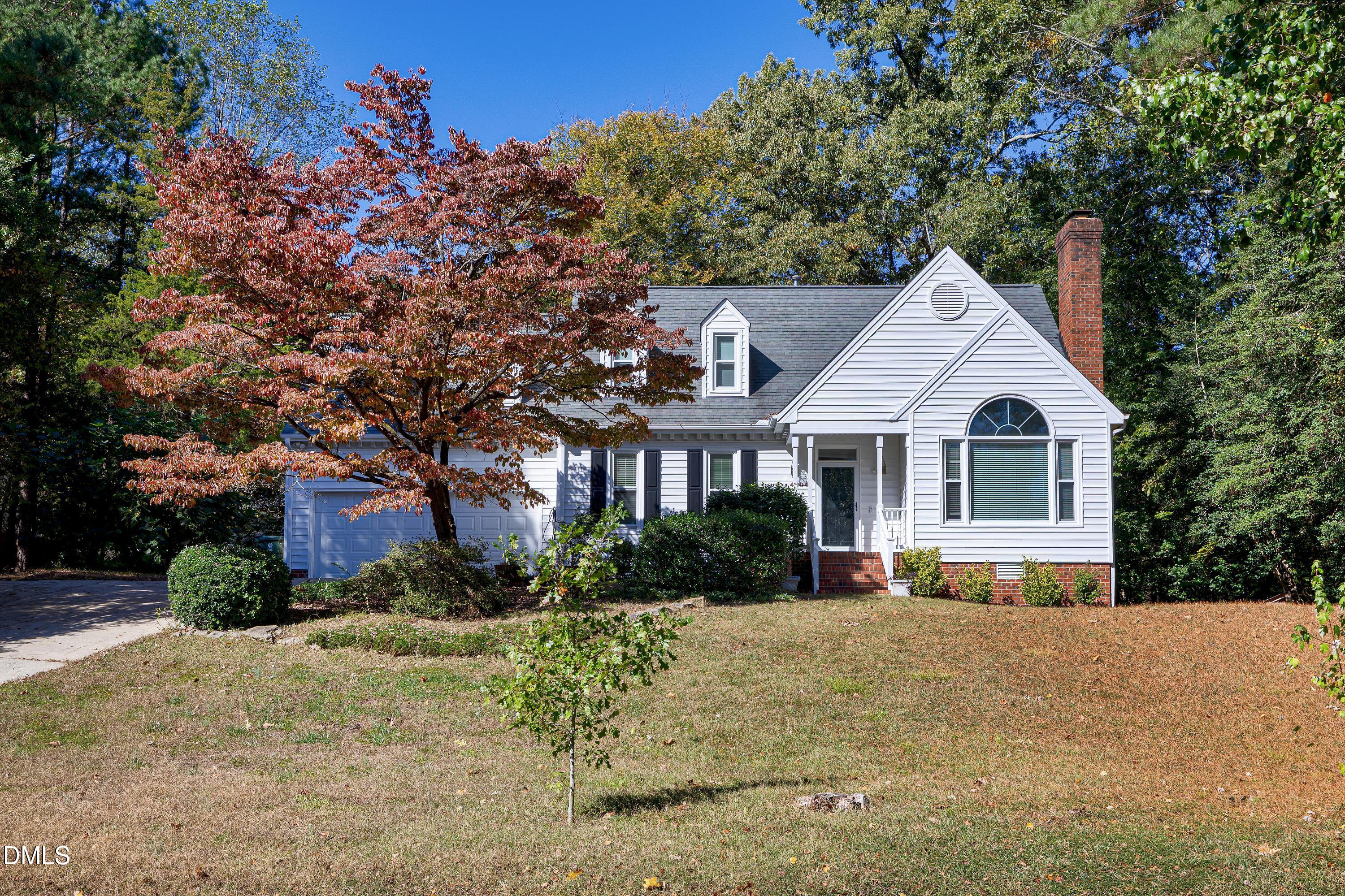 4804 Sinclair Drive Raleigh, NC 27616 - Photo 1 of 37 a front view of a house with a yard and trees